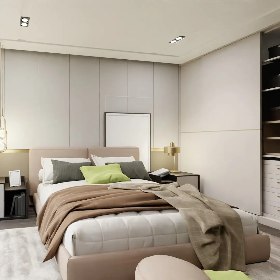 a bedroom with a bed and a chair